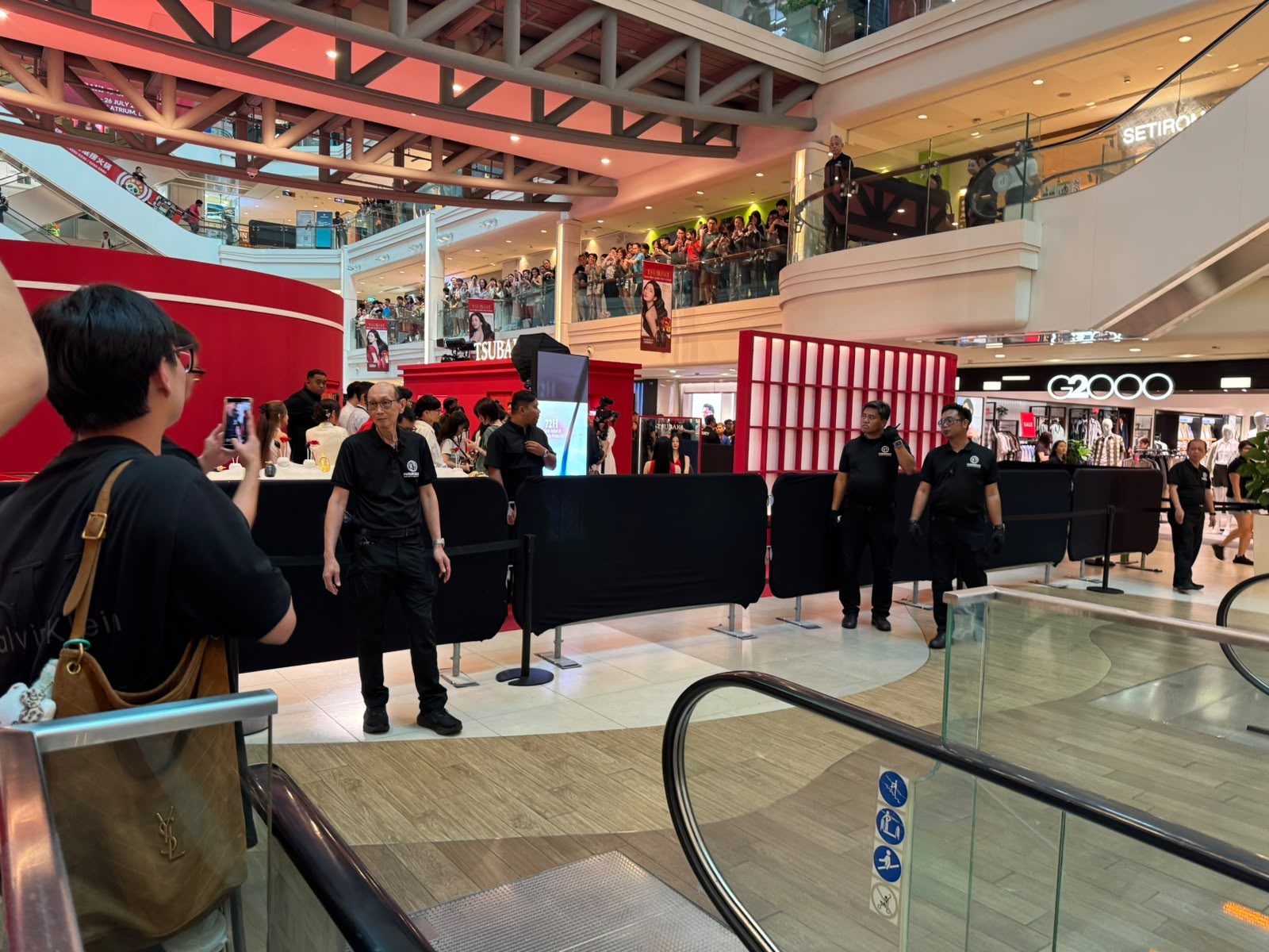 A Hawkeye officer team holding a barrier line at a public event in Singapore