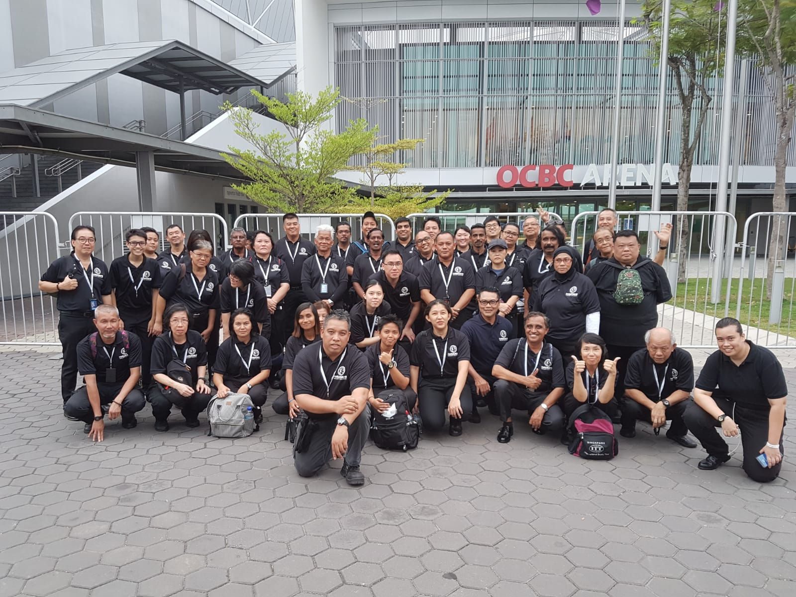 The Hawkeye Security team assembled outside OCBC Arena at the Singapore Sports Hub